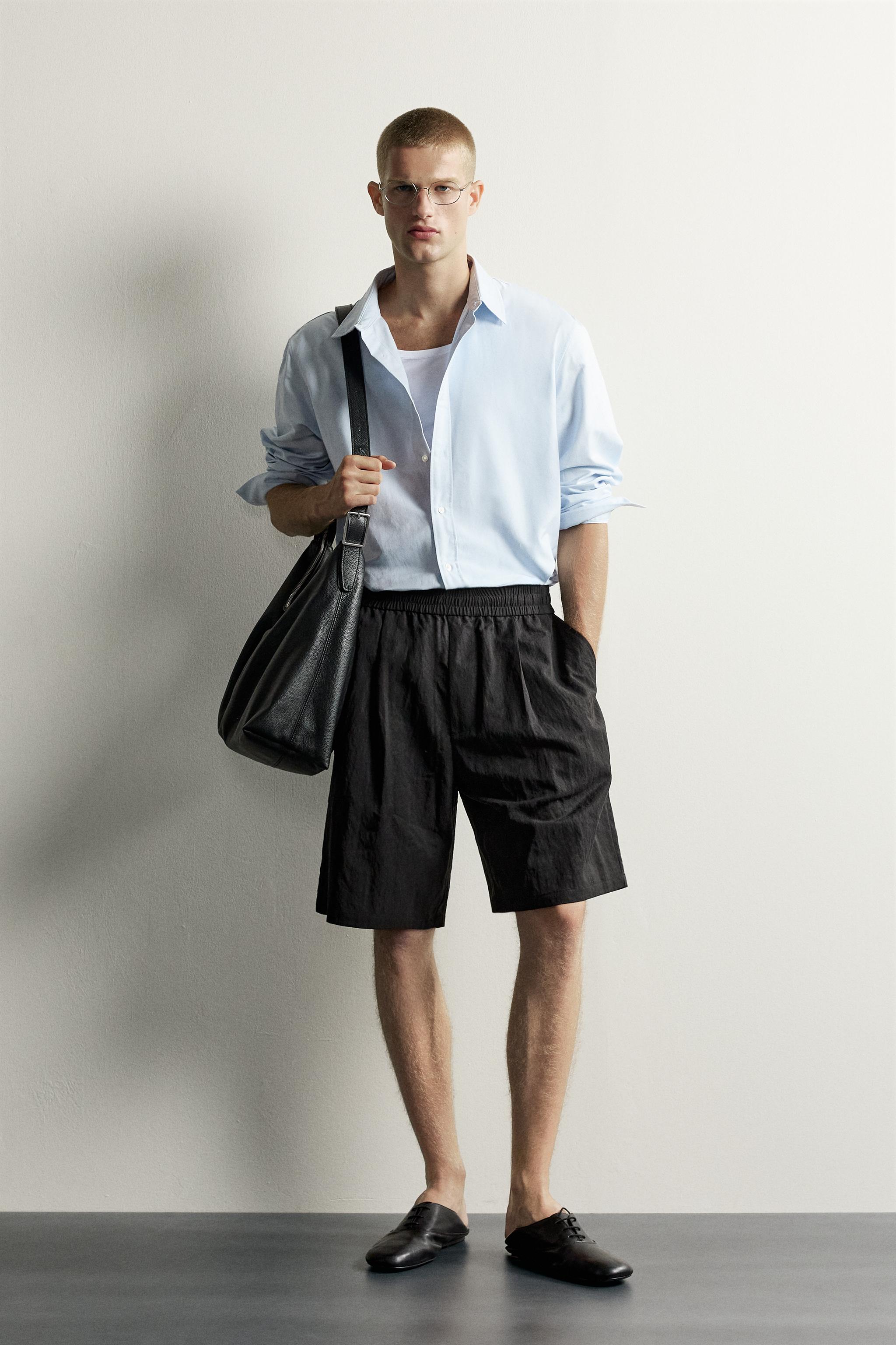 RELAXED FIT FLUID PLEATED SHORTS